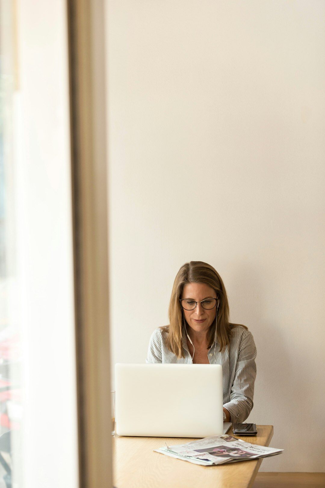 person using laptop for insurance comparison